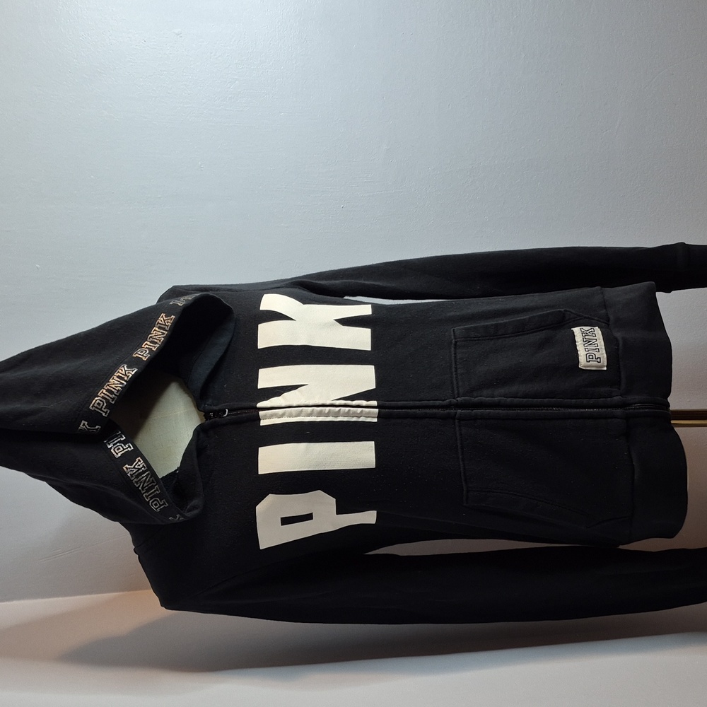 Pink black hoodie size medium  with logo